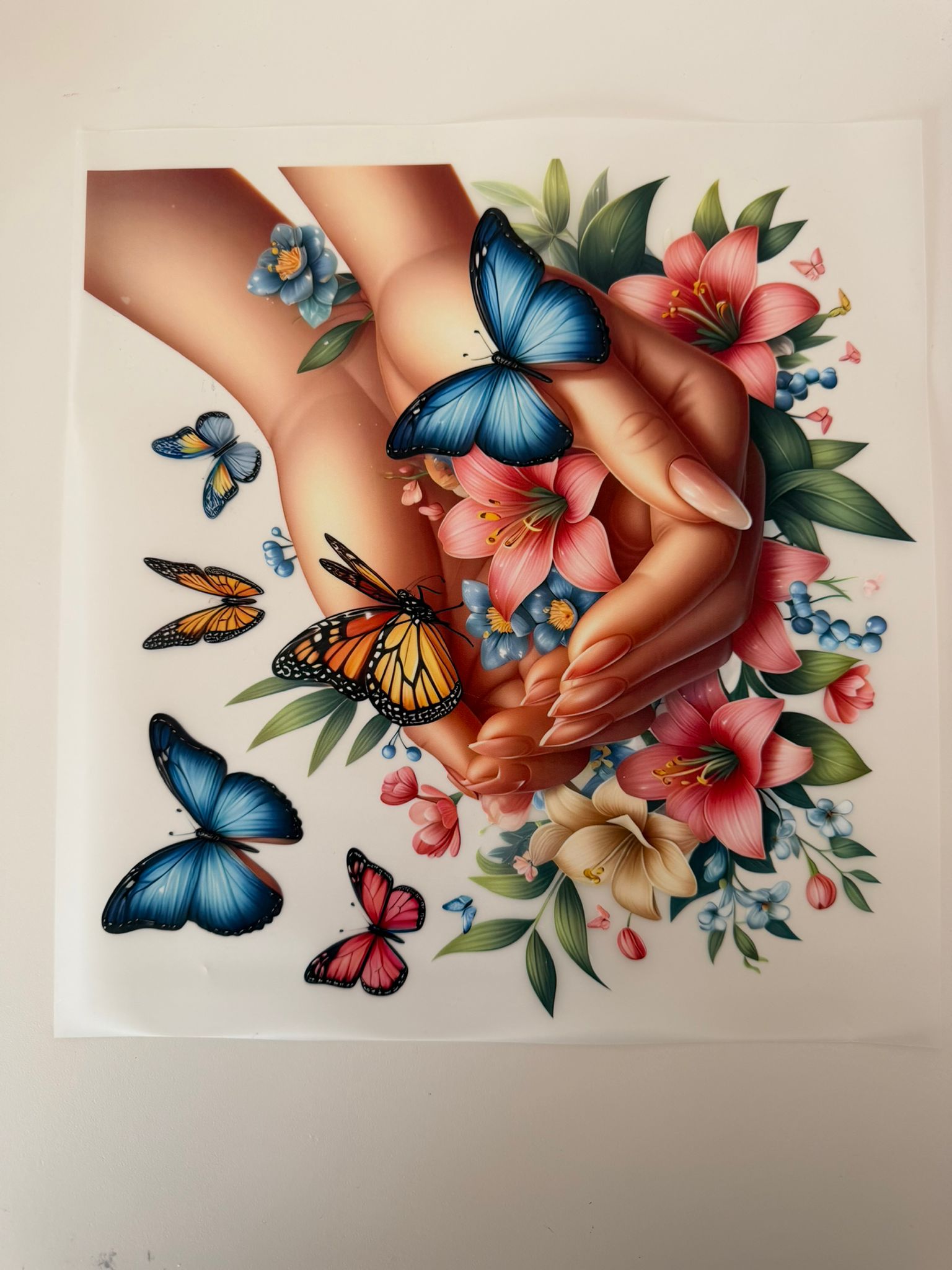 Bügelbild Hände/Blumen/Schmetterlinge